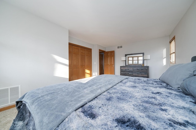 bedroom featuring visible vents