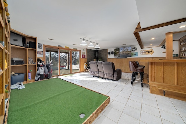 game room featuring recessed lighting, a wainscoted wall, and tile patterned floors