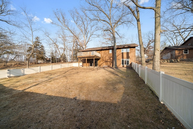 exterior space featuring a fenced backyard