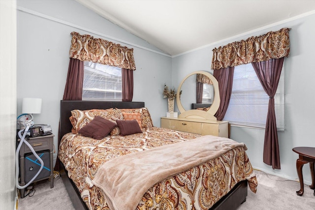 bedroom with carpet flooring and vaulted ceiling