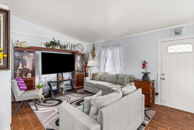 living room with wood finish floors and lofted ceiling