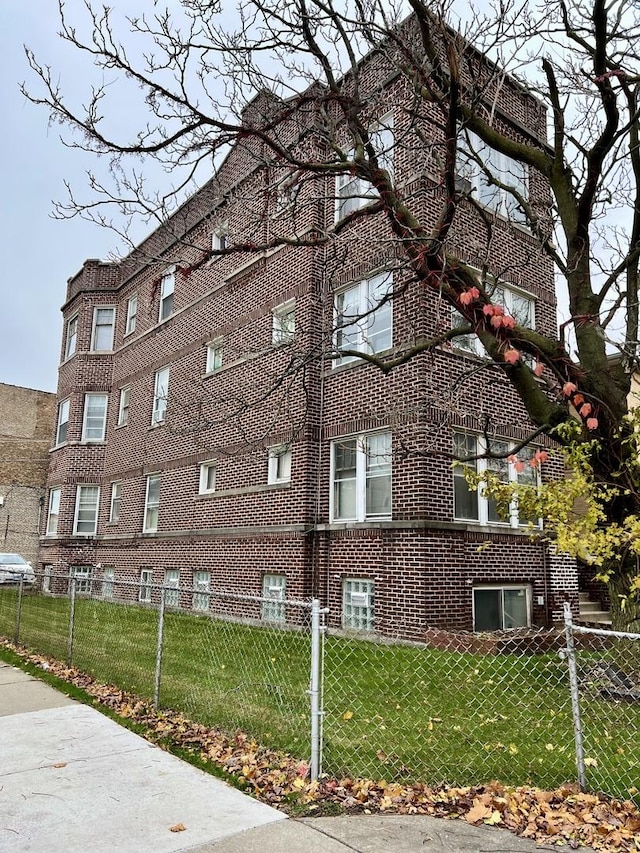 view of property featuring a fenced front yard