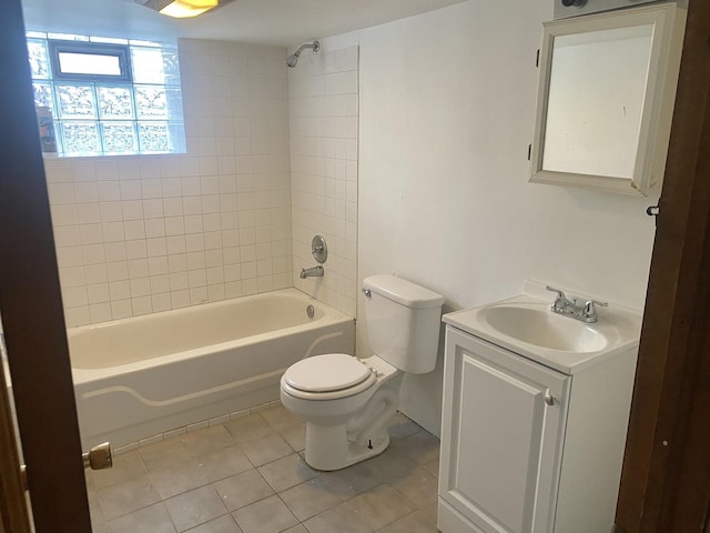 bathroom with toilet, bathtub / shower combination, vanity, and tile patterned floors