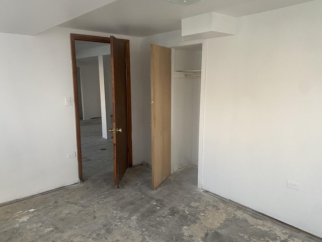 unfurnished bedroom with a closet