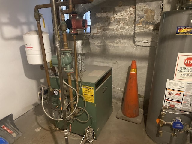 utility room featuring gas water heater and a heating unit