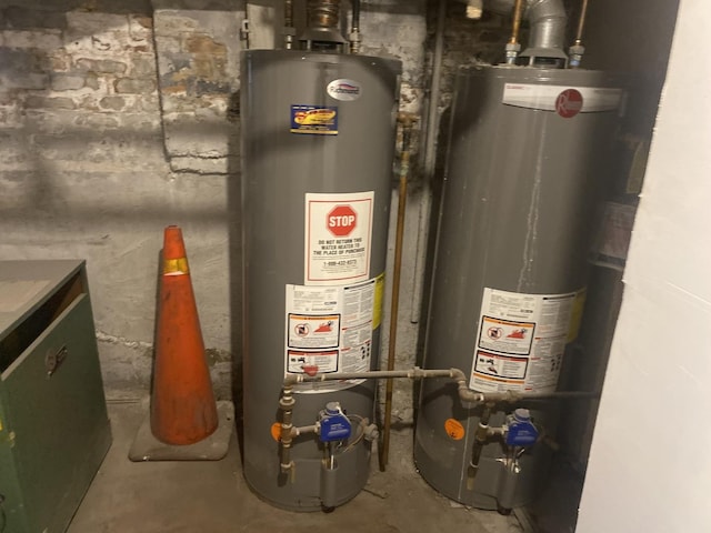 utility room featuring water heater