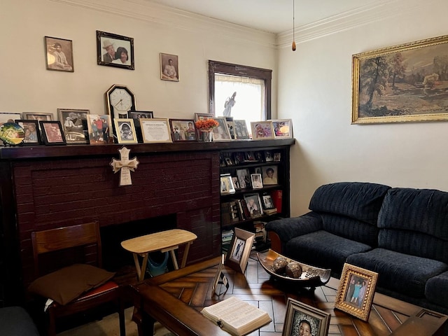 living area with a fireplace and ornamental molding