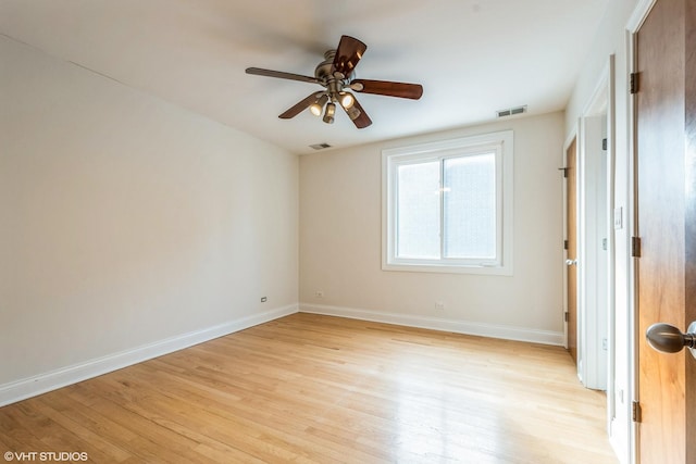 unfurnished bedroom featuring light wood-style floors, visible vents, and baseboards