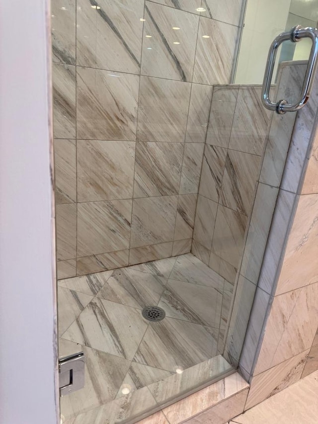 bathroom featuring a stall shower