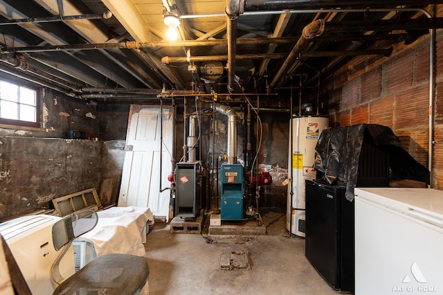 below grade area with fridge and gas water heater