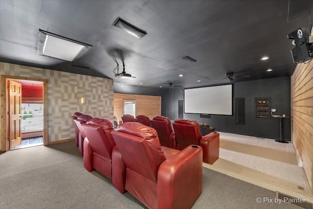 carpeted cinema with ceiling fan