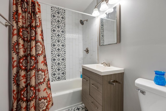 bathroom featuring toilet, shower / tub combo, and vanity