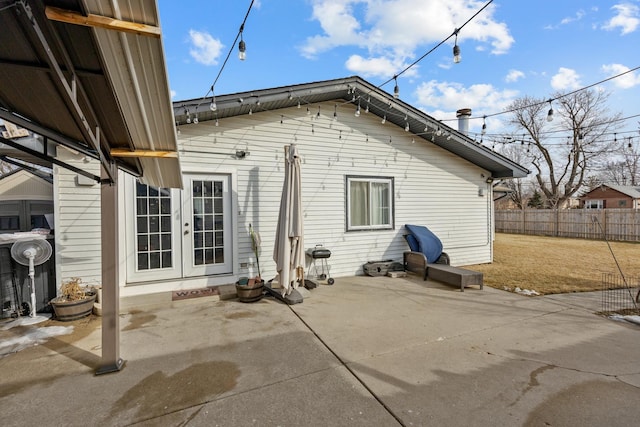 back of house featuring a patio, french doors, and fence