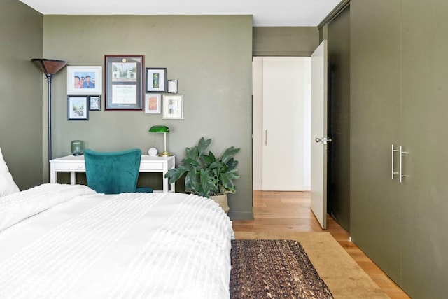 bedroom with light wood finished floors