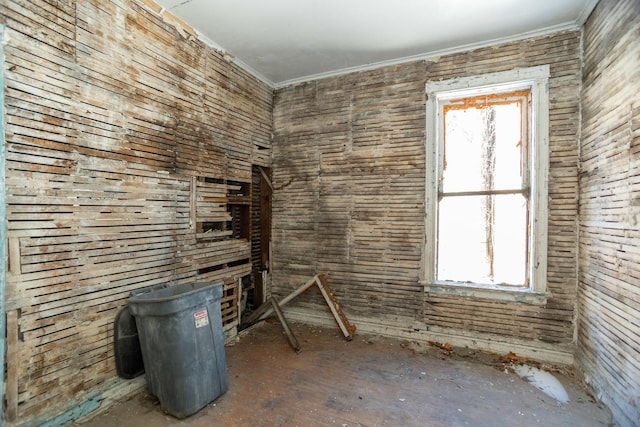 3827 W Gladys Ave, Chicago, IL 60624 - unfurnished living room featuring plenty of natural light and crown molding