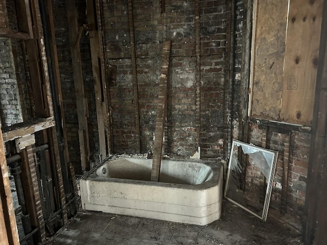 bathroom featuring a tub to relax in