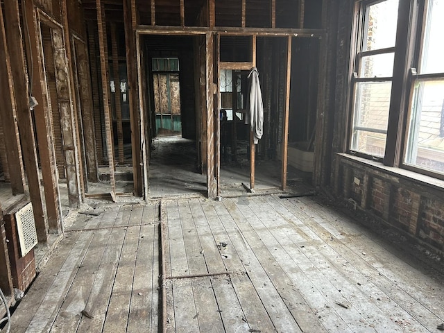 miscellaneous room featuring wood-type flooring