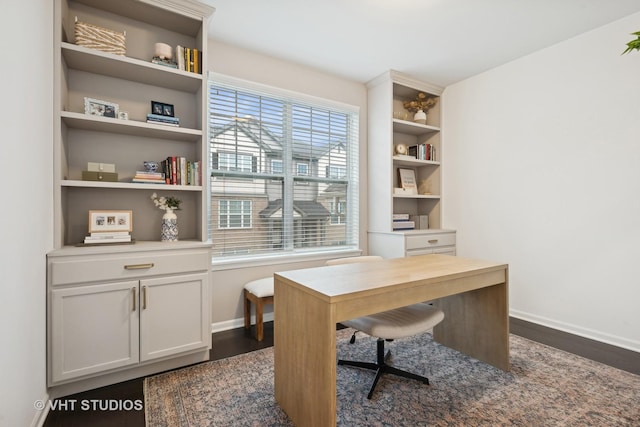 office space with baseboards and dark wood-style flooring