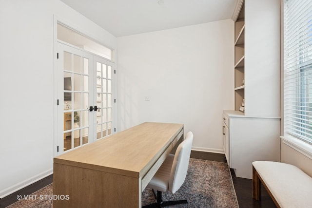 office area with baseboards, dark wood-type flooring, and french doors