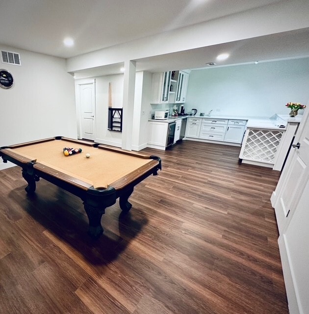 game room featuring dark wood-type flooring, recessed lighting, visible vents, and billiards