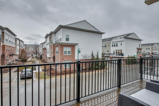 balcony featuring a residential view