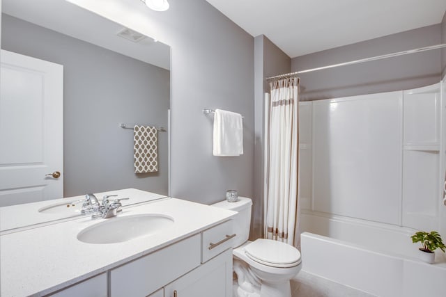 bathroom with toilet, vanity, visible vents, and shower / tub combo with curtain