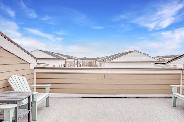 view of patio / terrace with a residential view and a balcony