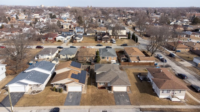 birds eye view of property with a residential view