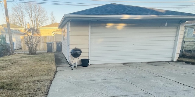 garage featuring fence