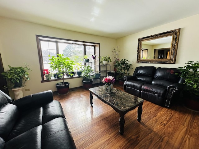 living area with wood finished floors