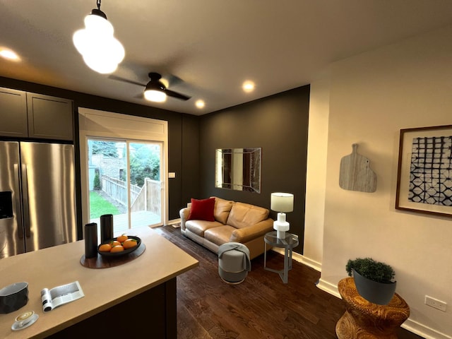 living room with ceiling fan, baseboards, dark wood-style flooring, and recessed lighting