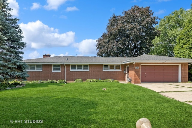 ranch-style house featuring driveway, a chimney, an attached garage, a front lawn, and brick siding