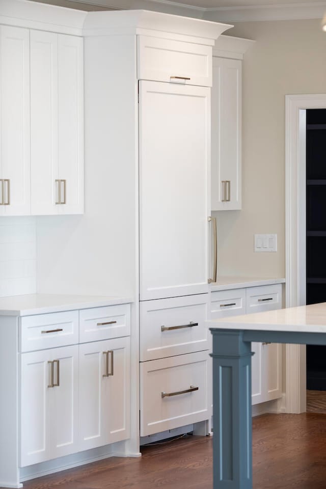 31 Golden Larch Ct, Naperville, IL 60540 - bar featuring dark wood finished floors, backsplash, and crown molding