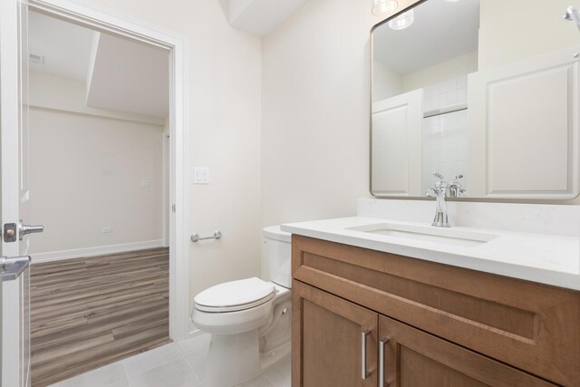 31 Golden Larch Ct, Naperville, IL 60540 - bathroom featuring tile patterned floors, baseboards, toilet, and vanity