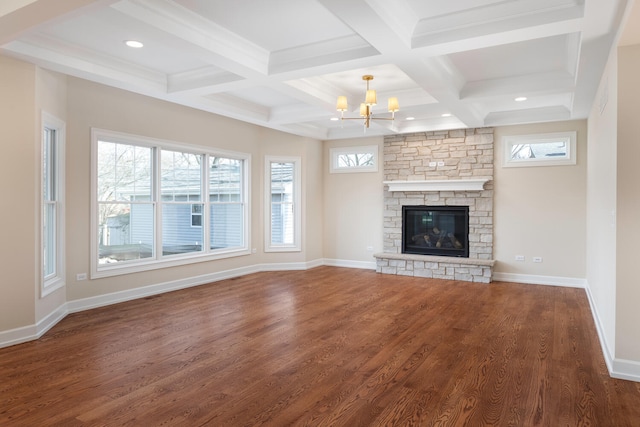 31 Golden Larch Ct, Naperville, IL 60540 - unfurnished living room with beamed ceiling, wood finished floors, an inviting chandelier, a fireplace, and baseboards
