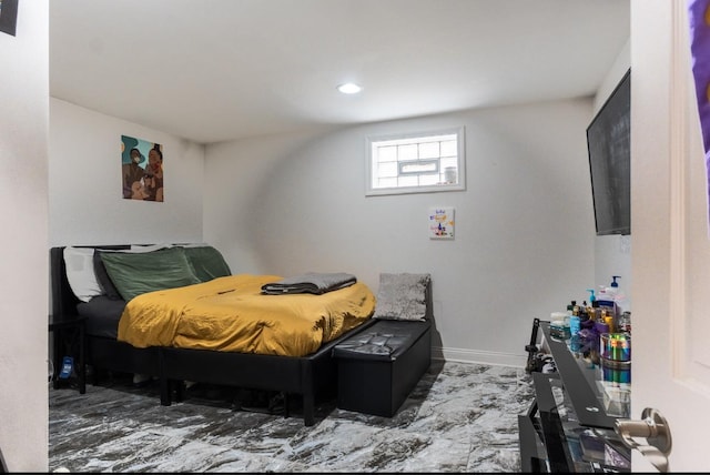 bedroom featuring marble finish floor, recessed lighting, and baseboards