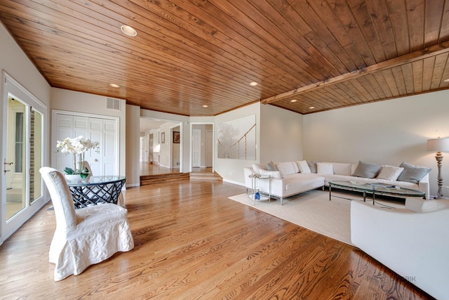 living room with recessed lighting, visible vents, wood finished floors, wooden ceiling, and baseboards