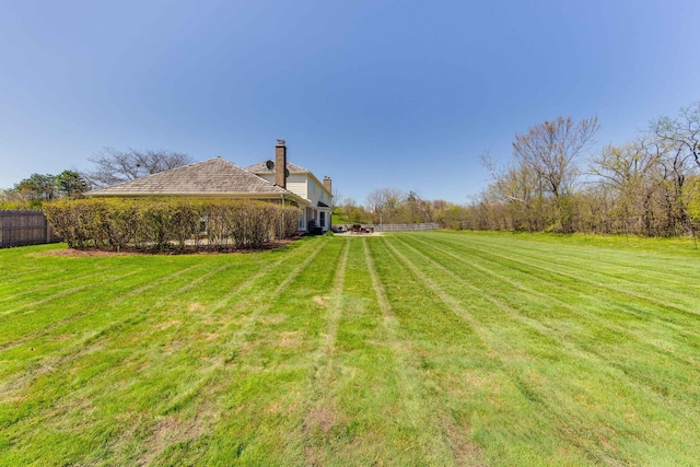 view of yard with fence