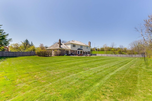 view of yard featuring a fenced backyard and a patio