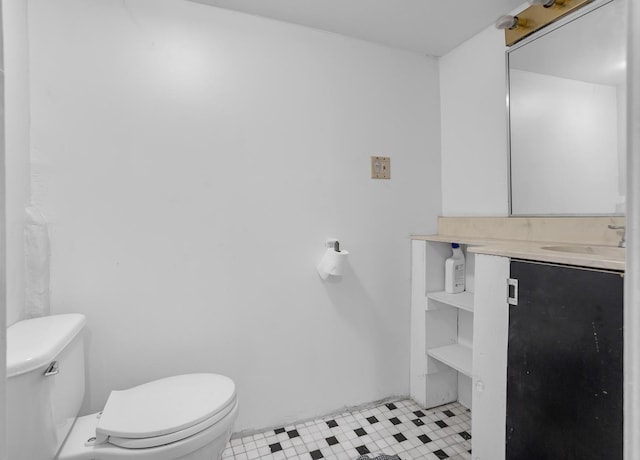 half bath with vanity and toilet