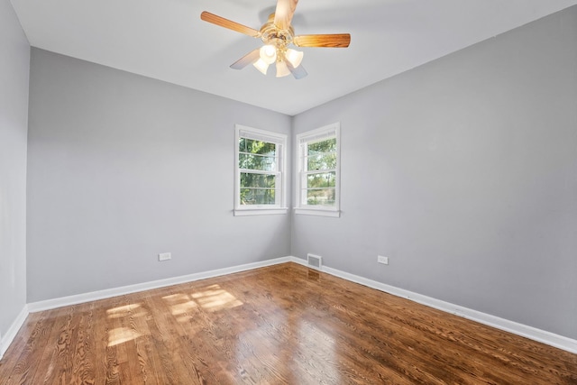 200 S Roselle Rd, Roselle, IL 60172 - empty room with baseboards, ceiling fan, and wood finished floors