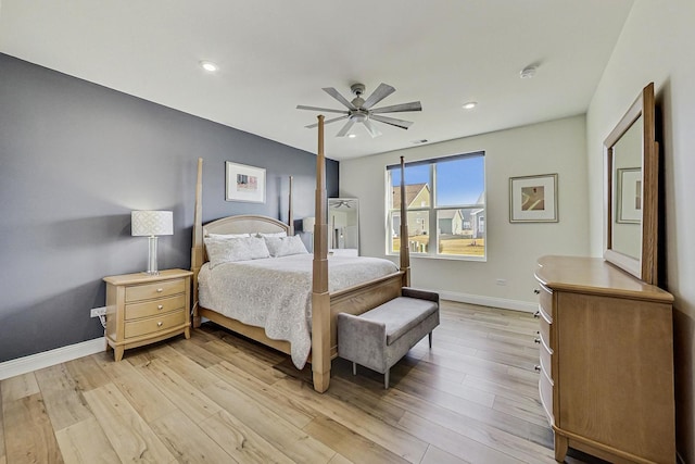 bedroom featuring recessed lighting, ceiling fan, light wood-style flooring, and baseboards