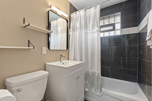 bathroom with shower / bath combination with curtain, vanity, and toilet