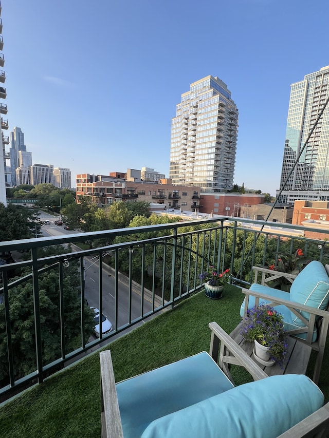 balcony featuring a view of city