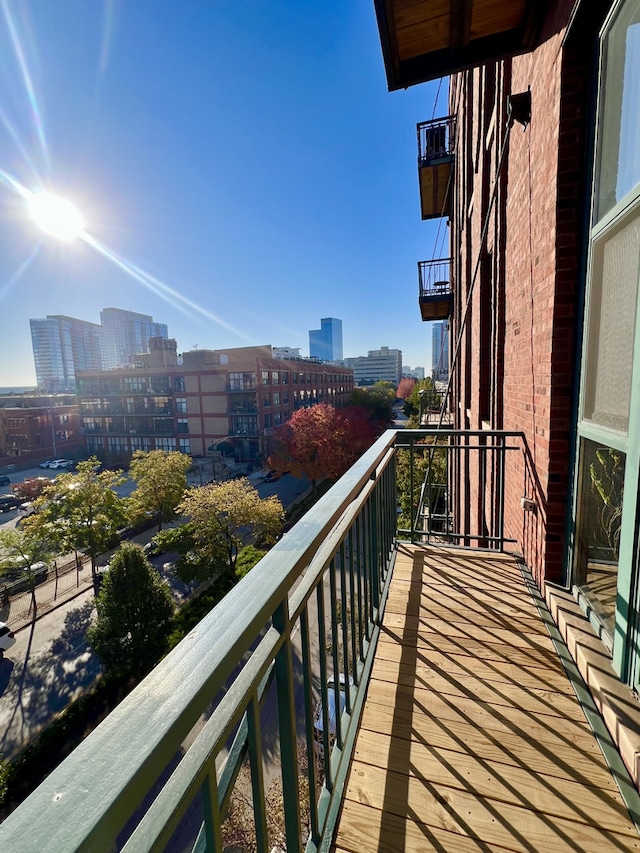 balcony featuring a city view