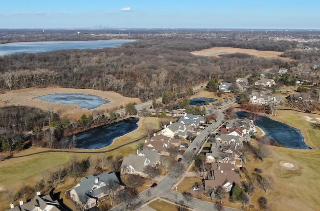 bird's eye view with view of golf course and a water view