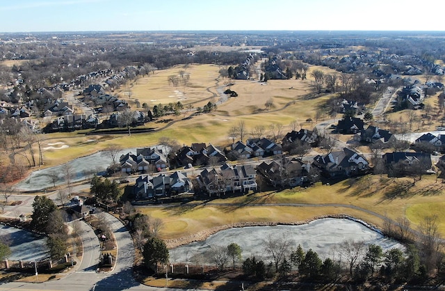 aerial view with golf course view, a water view, and a residential view