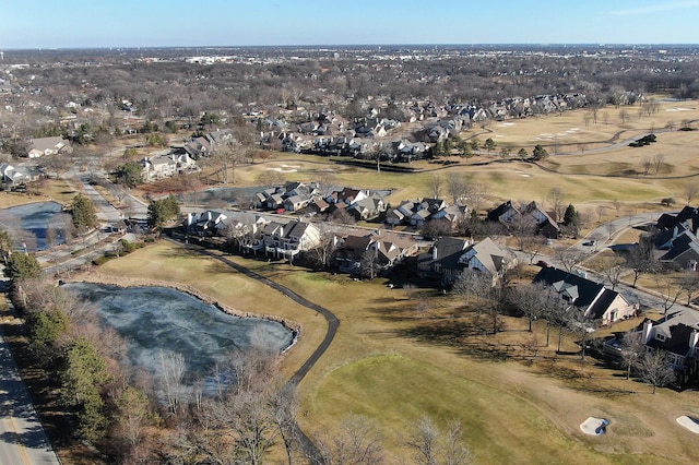 bird's eye view with golf course view and a residential view