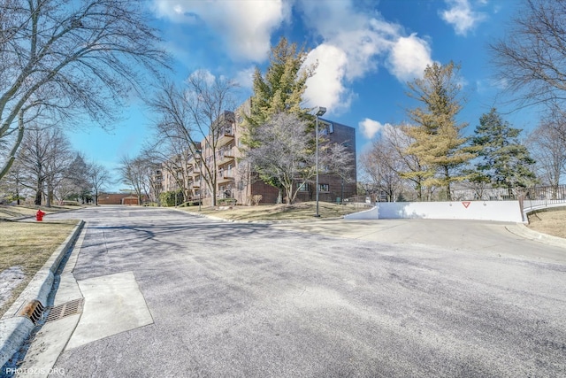 view of road with curbs