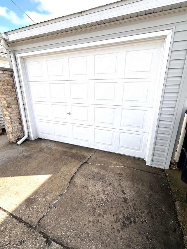 garage featuring driveway